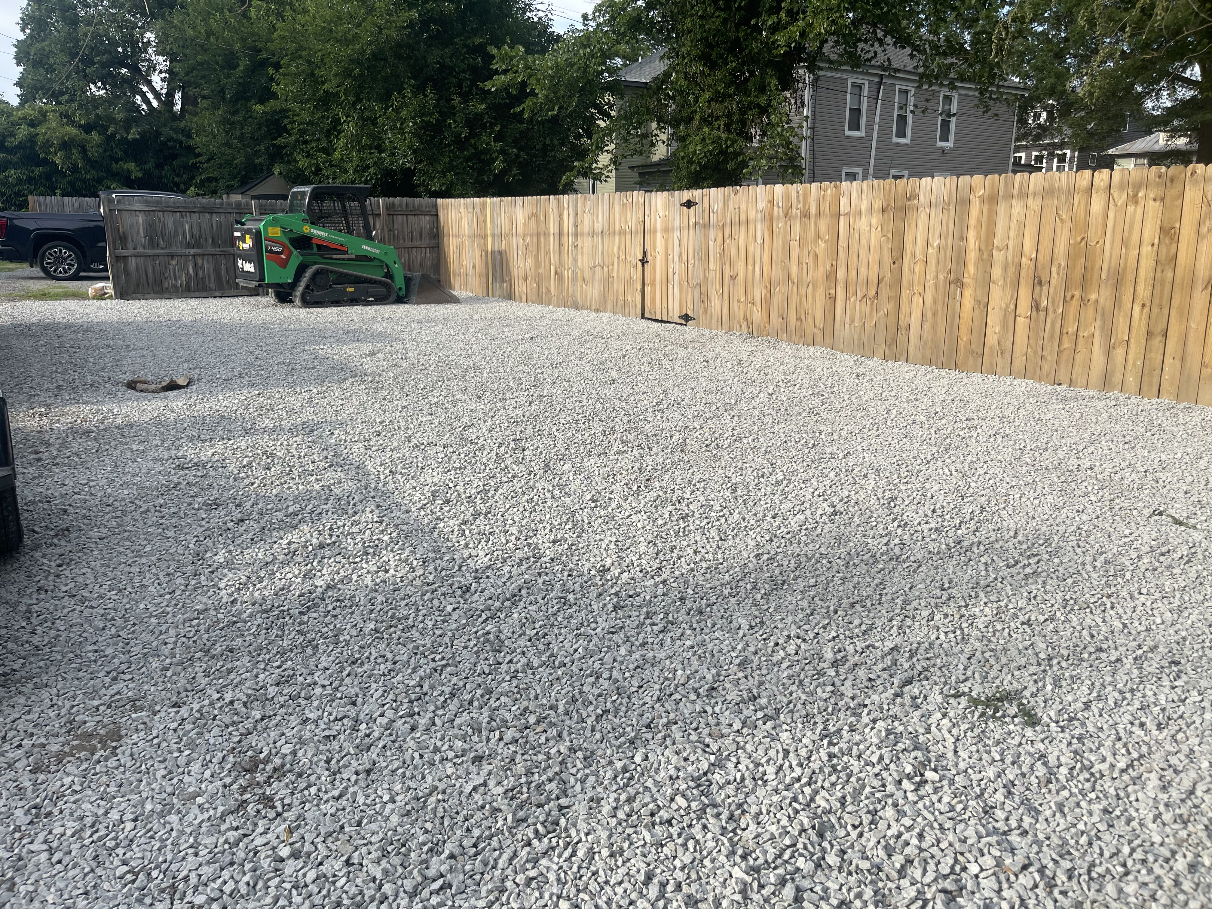Gravel shed and parking pad