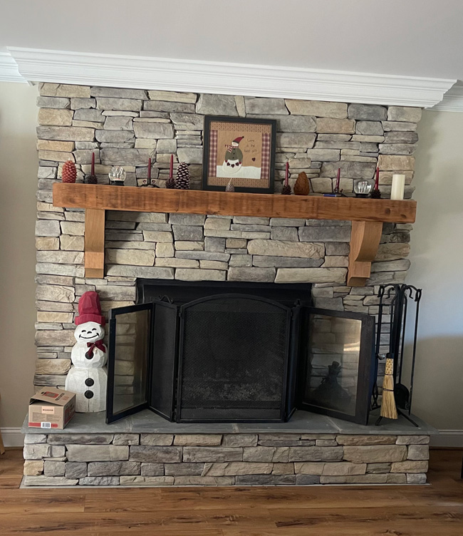 Painted Brick Fireplace to Stone Veneer Redesign