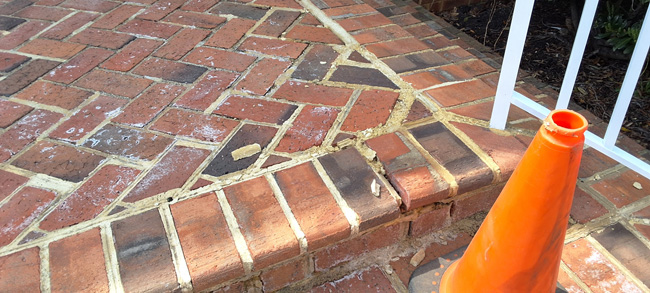 Brick steps showing mortar damage